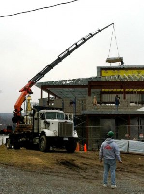 Plywood Lifted To Roof 